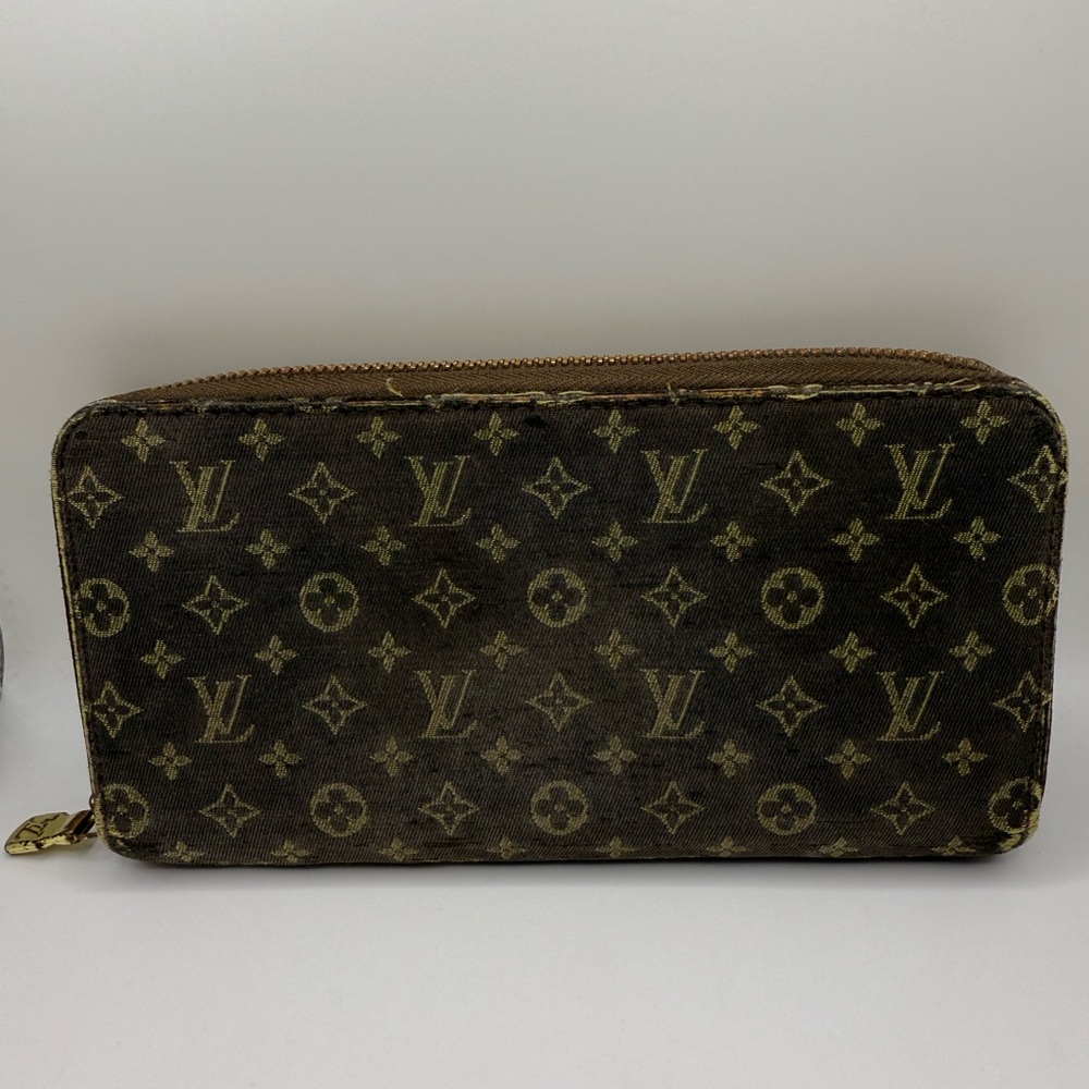 Authentic Louis Vuitton Brown Monogram Mini Lin Zippy Wallet